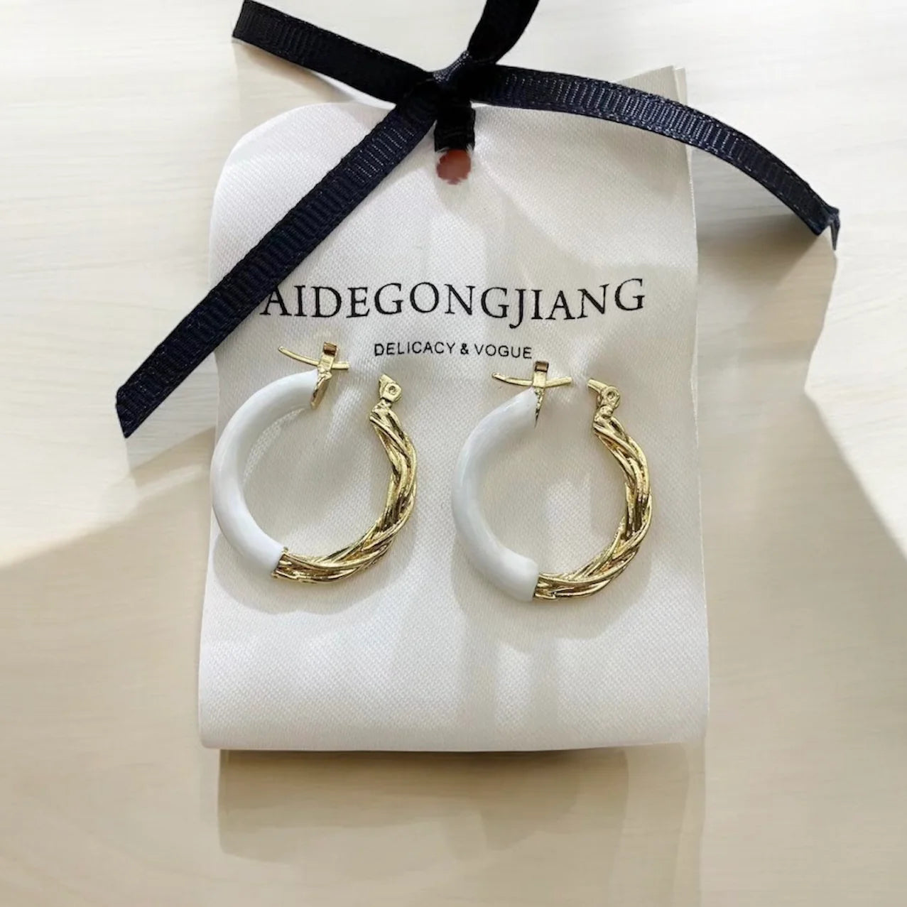 Adela Hoops White